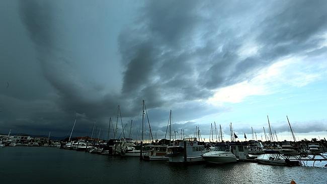 An afternoon storm forms over the Gold Coast Hinterland and Mt Tamborine area pictured from Hope Island Marina. Pic by David Clark